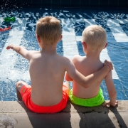 Two kids in swimming pool